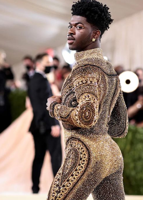 Lil Nas X posing at the metgala