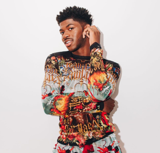 Lil nas x posing in a jeans