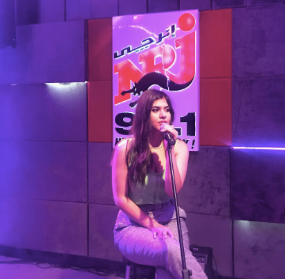 Nathalie Saba performing in a music session