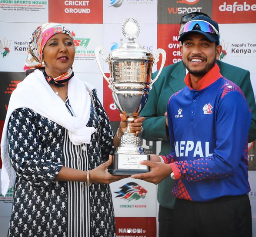 sandeep lamichhane accepting the trophy after the win